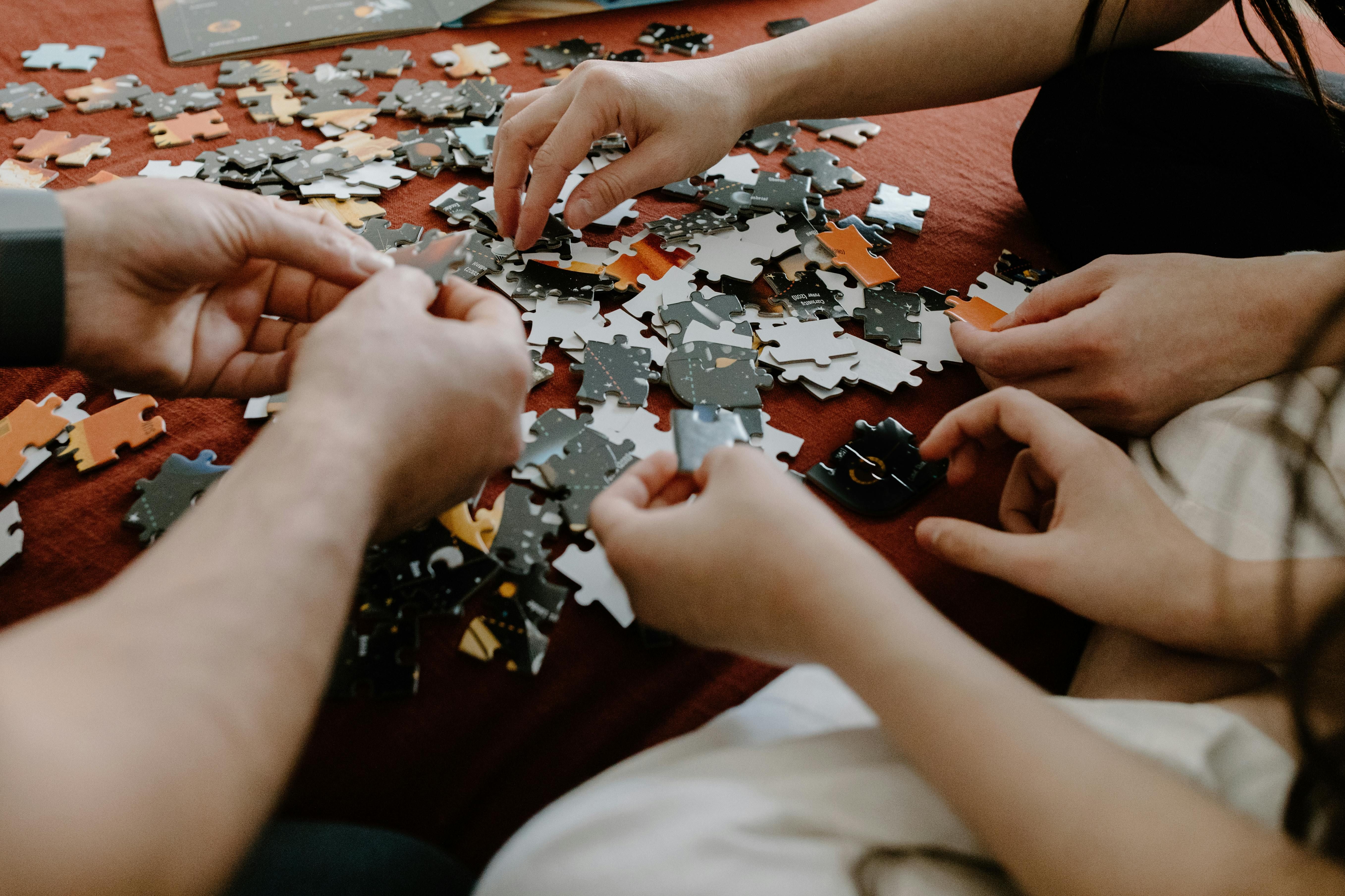 People working on puzzles together